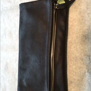 Claire V waxed suede fold over clutch